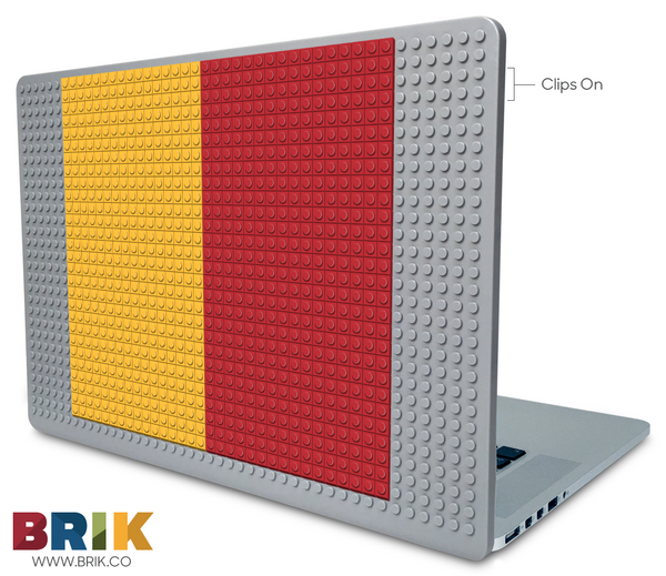 yellow and red BY Quirino Laptop Case